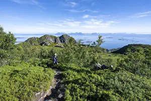 Hikers on trail to Dronningsvarden or Stortinden