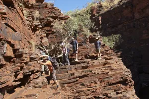 Hiking and rock climbing Hancock Gorge Karijini National Park Pilbara region western australia WA