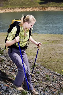 Hiking woman in front of wilde nature