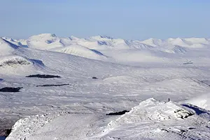 Hillwalker looking across the edge of Rannoch Moor to Ben Nevis