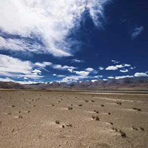 Himalaya high mountain landscape panorama with blue cloudy sky