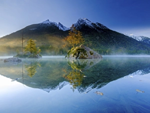 Hintersee with morning fog at sunrise