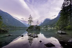 Hintersee with rocks and trees in the foreground