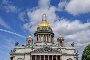 Framed Print : Historic building with golden dome and architectural details against a blue sky