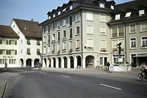 Historic buildings and Dornach fountain with statue, Dornach fountain, Rossmarktplatz, Solothurn, Switzerland, July 1959, Europe