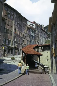 Historic buildings in the old town centre of Lausanne, Switzerland, 1974 covered staircase on the street, Europe