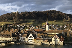 The historic city of Stein am Rhein with the castle Hohenklingen in the evening light
