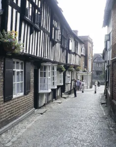 Historic half-timbered houses in a cobbled street, Ledbury, Herefordshire, England, UK 1970s