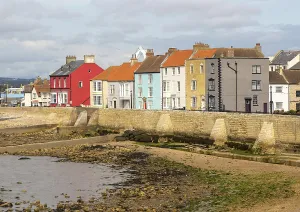 Historic houses overlooking harbour on medieval Town Wall