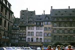 Historic medieval half-timbered buildings on the Place de la Cathedrale, city centre of Strasbourg, Alsace, France 1974