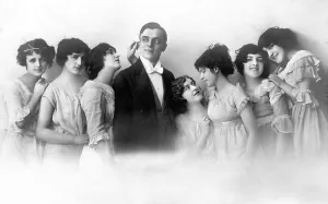 Historic photo, a man with seven women, ca. 1920