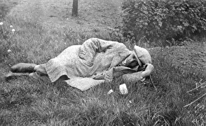 Historic photo, man sleeping in the grass