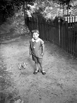 Historic photograph, child with toy, thirties