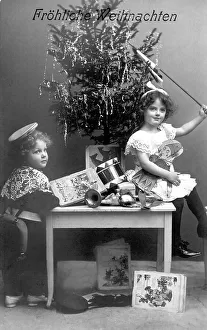 Historic photograph, children beneath a Christmas tree