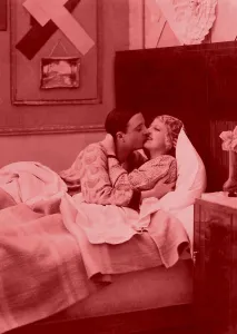 Historic photograph, couple in bed, around 1910