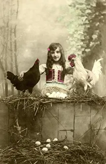Historic photograph, girl with two chickens