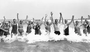 Historic photograph, happy group of swimmers