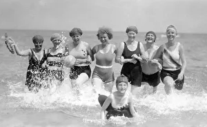Historic photograph, happy group of swimmers