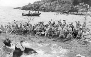 Historic photograph, happy group of swimmers