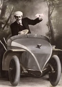 Historic photograph, man driving a cardboard car