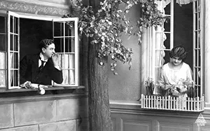 Historic photograph, man flirting with his neighbour