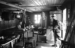 Historic photograph, mountain climber in a mountain hut