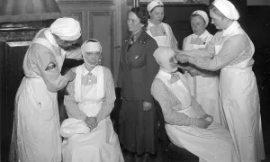 Historic photograph, nurses practicing bandaging
