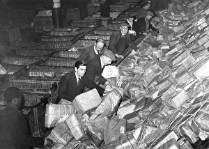 Historic photograph, postal workers sorting packages