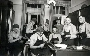 Historic photograph, soldiers taking care of their equipment