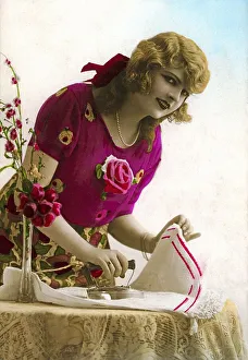 Historic photograph, woman ironing, ca. 1915