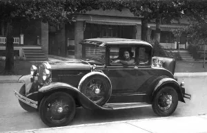 Historic photograph, woman behind the steering wheel