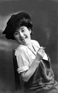 Historic photograph, woman sticking out her tongue