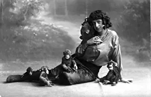 Historic photograph, woman with toy monkeys