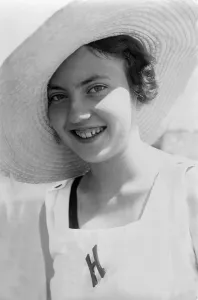 Historic photograph, woman wearing a large hat posing for the camera