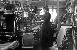 Historic photograph, woman working on a loom