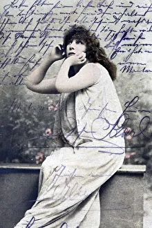 Historic postcard with a pensive woman