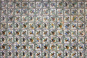 Historic tiled wall with satyrs