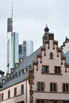 The historic town hall of Frankfurt with a skyscraper in the background