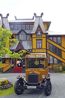 Historic wooden hotel and vintage car