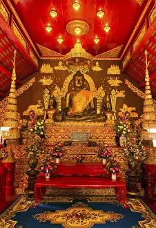 Historical bronze Buddha in the Viharn of Phra Kaeo