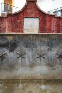 A historical fountain in Ojen, Spain