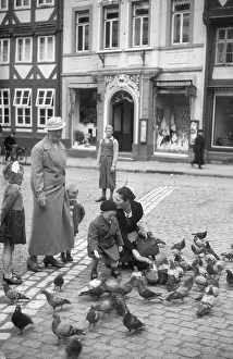 Historical image of 1930s, two women with three toddlers