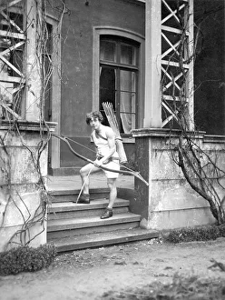 Historical image, boy with a bow and arrow