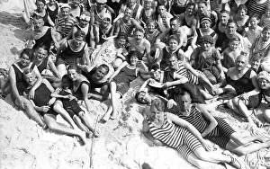 Historical photo, group of people at the beach