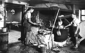 Historical photo, two men in chalet