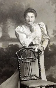 Historical photo, woman with a chair