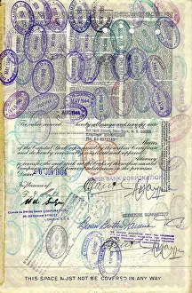 Historical stock certificate, back side with many stamps