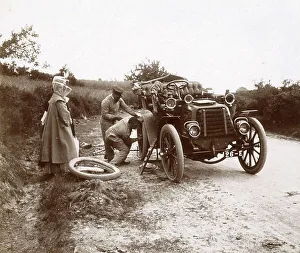History of the Automobile, changing the tyres of a car on a country road