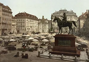 Am Hof, Vienna, Austria, with open air market and equestrian statue in foreground
