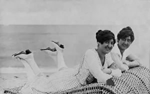 Holiday, two women on beach chairs